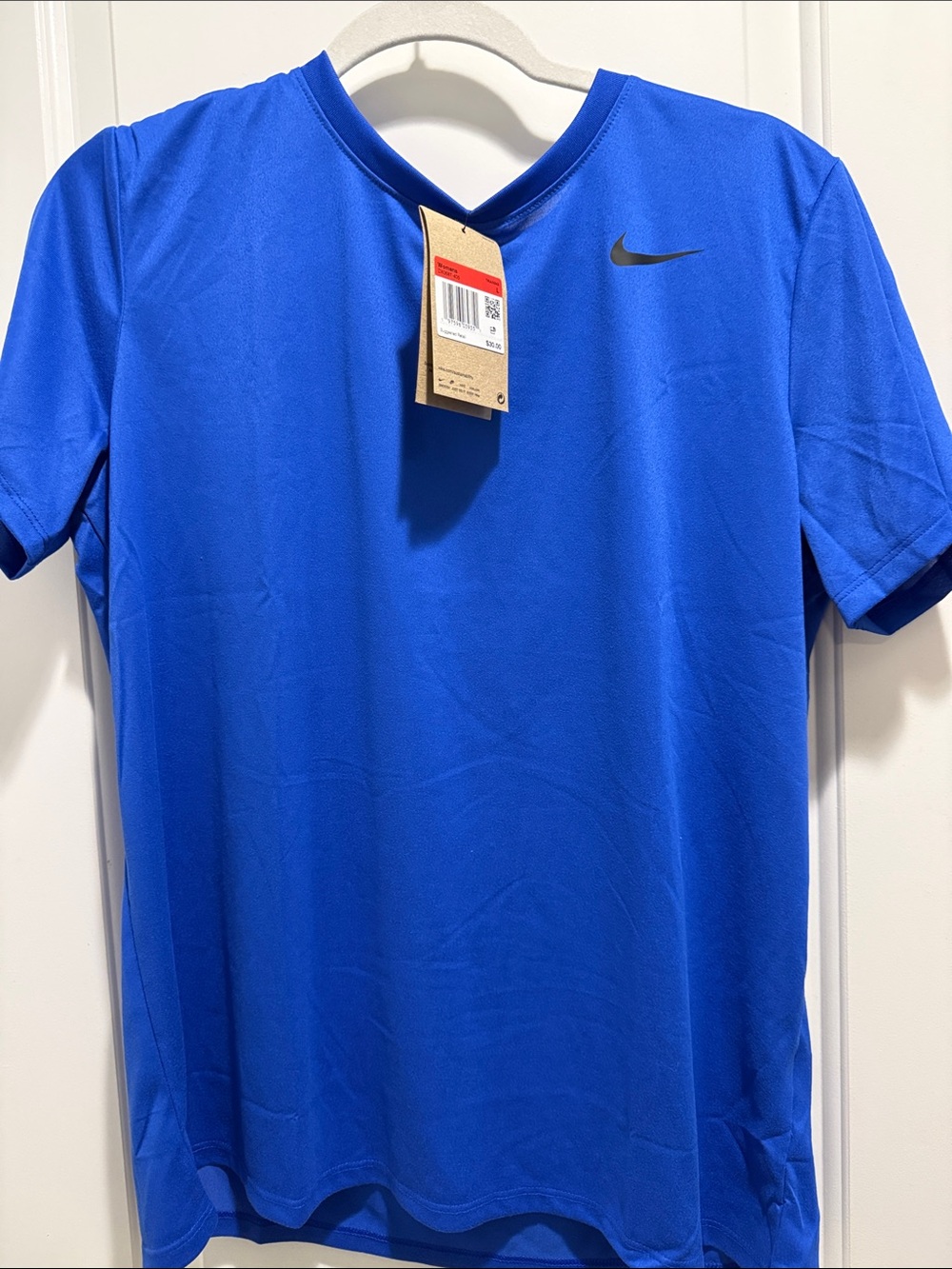 NWT Woman’s Nike Royal Blue Short Sleeve Dri-FIT Tee with Black Swoosh
